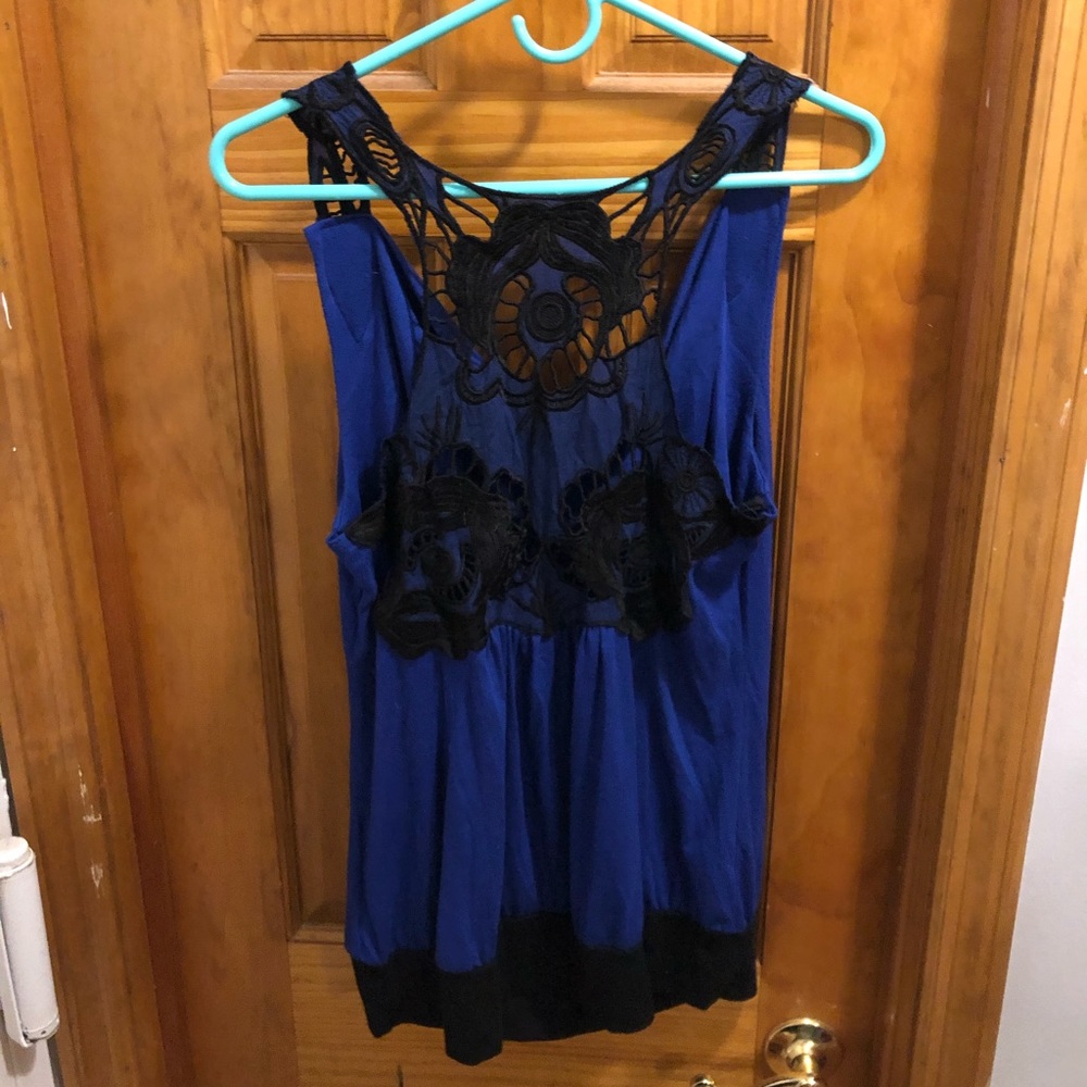 bright blue tank with lace appliqué back